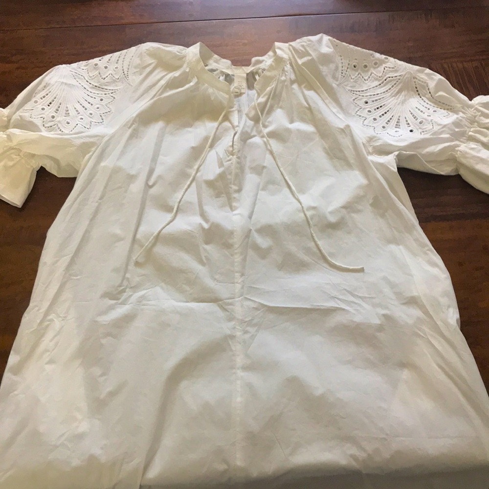 White midi dress with statement sleeves